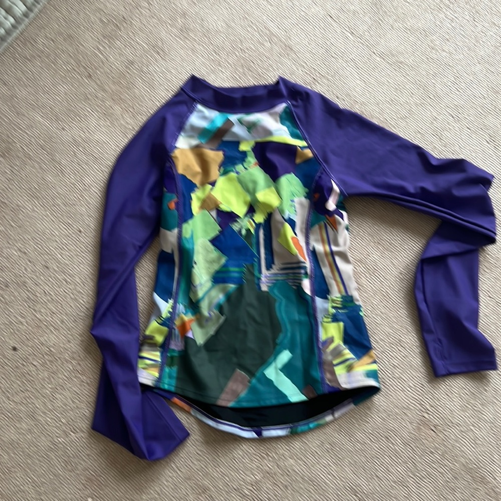 ella size 12 multi color rash guard- never worn and retails for 60$$